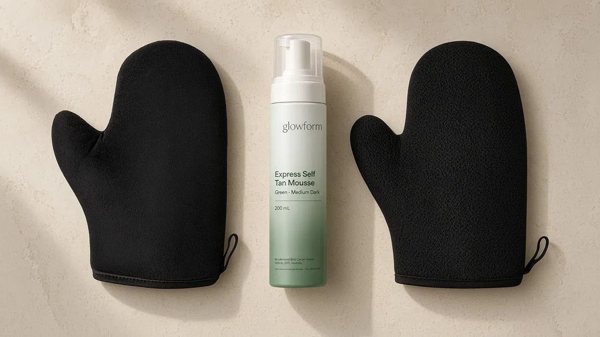 Glowform Glow kit on stone: Green Medium Dark mousse with tanning and exfoliating mitts