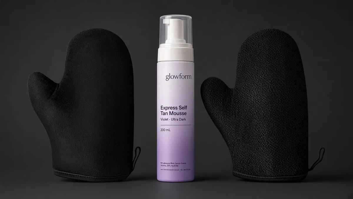 Glowform Glow kit: Violet Ultra Dark mousse between a tanning mitt and an exfoliating mitt
